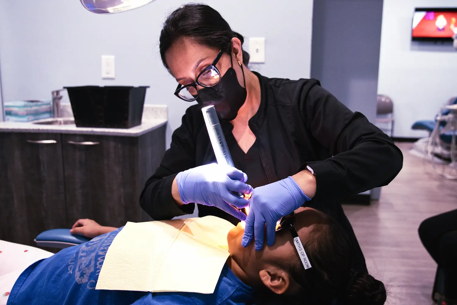 Dental professionals providing treatment in an Oak partner practice